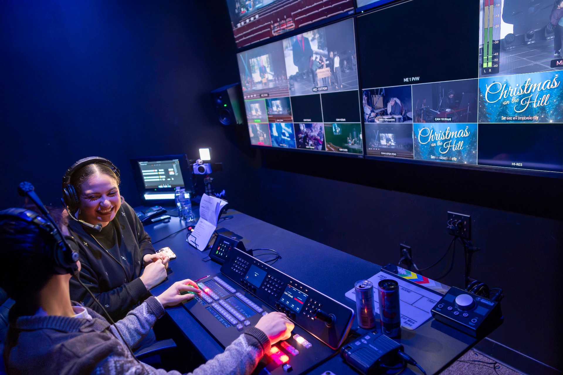 Students serving in the New Hope production control room during a live worship gathering